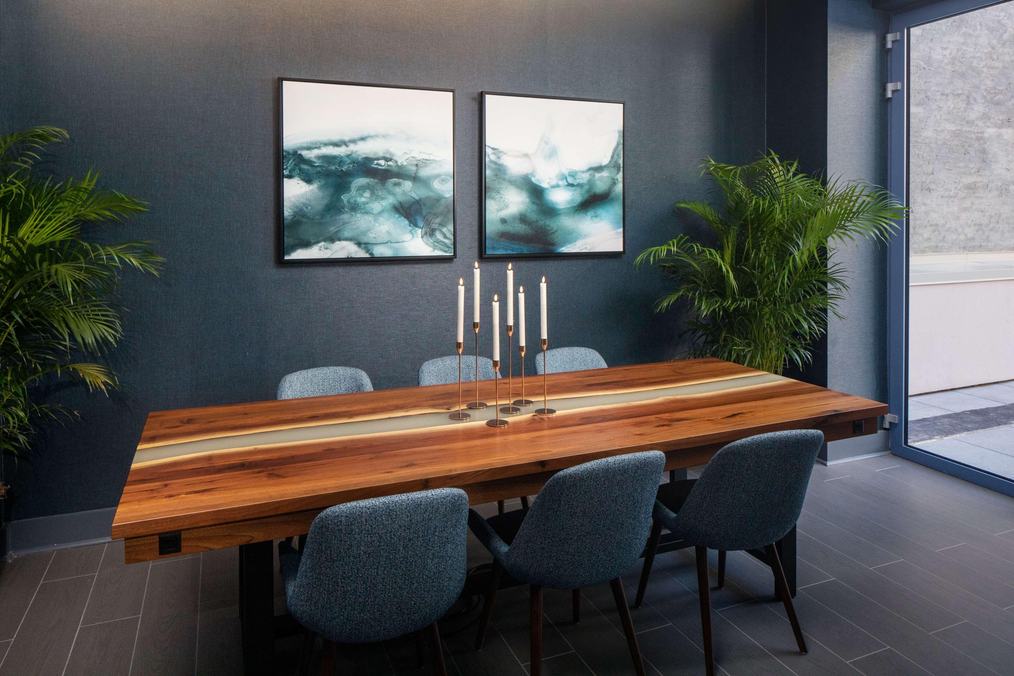 Hyatt Place New York Chelsea Exterior photo A dining room table with a resin river in the middle.
